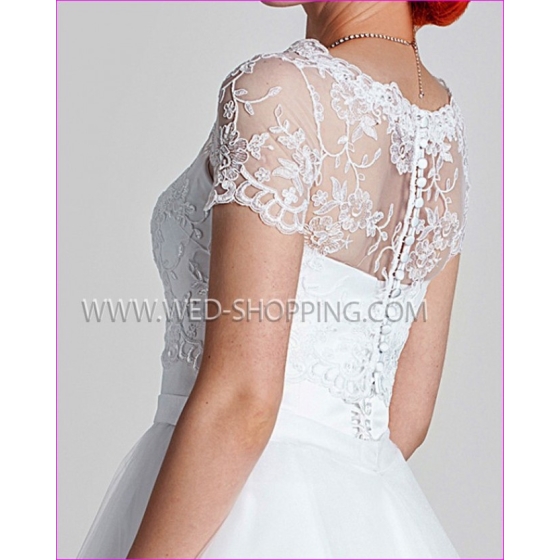 Spetsbolero knappar i ryggen